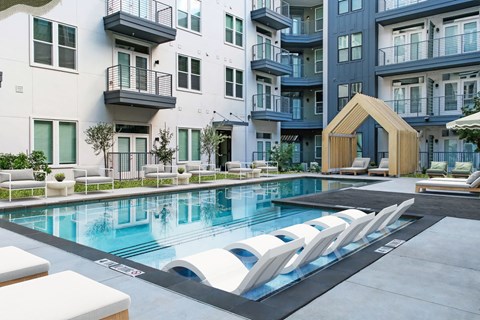 a swimming pool in the middle of an apartment building
