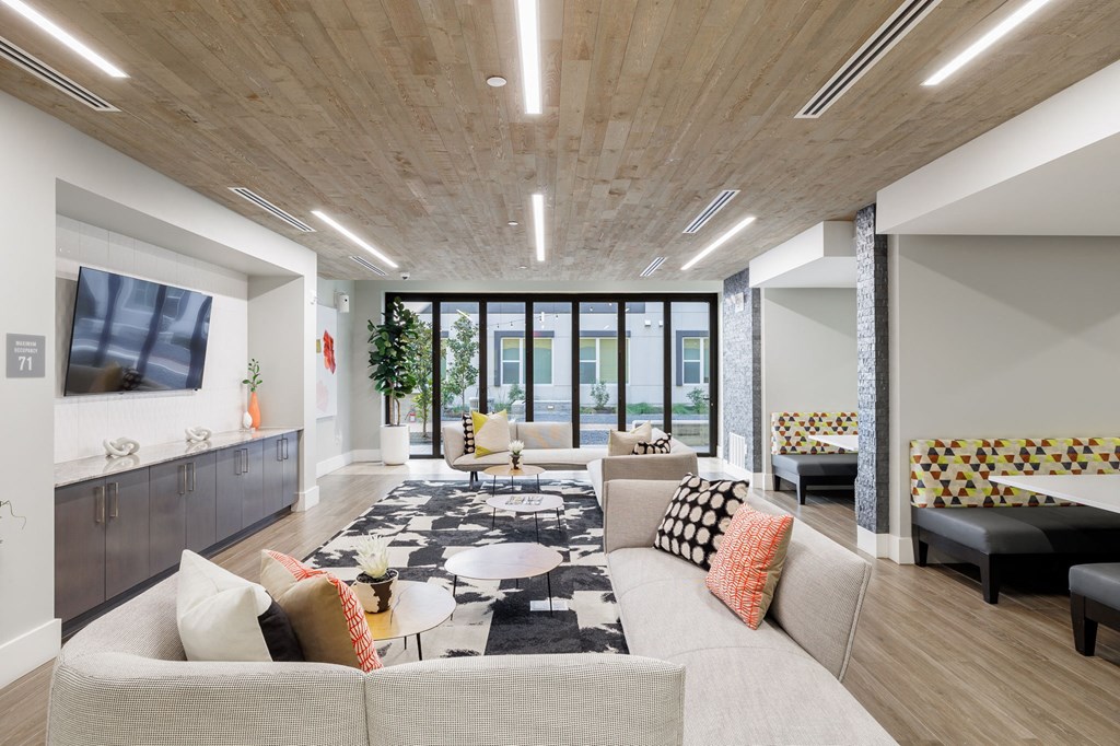 a living room with a couch and a table