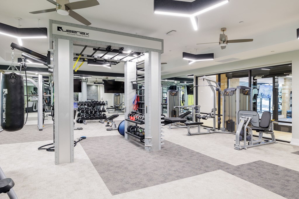 the gym at the flats at big tex apartments