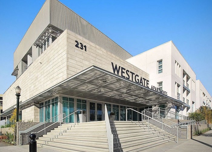 a large building with stairs in front of it