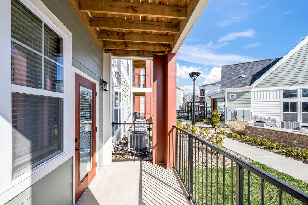 a row of balconies on a building with a blue sky in the background