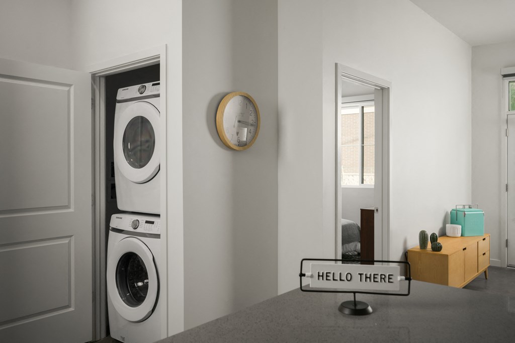 In-unit stacked washer and dryer