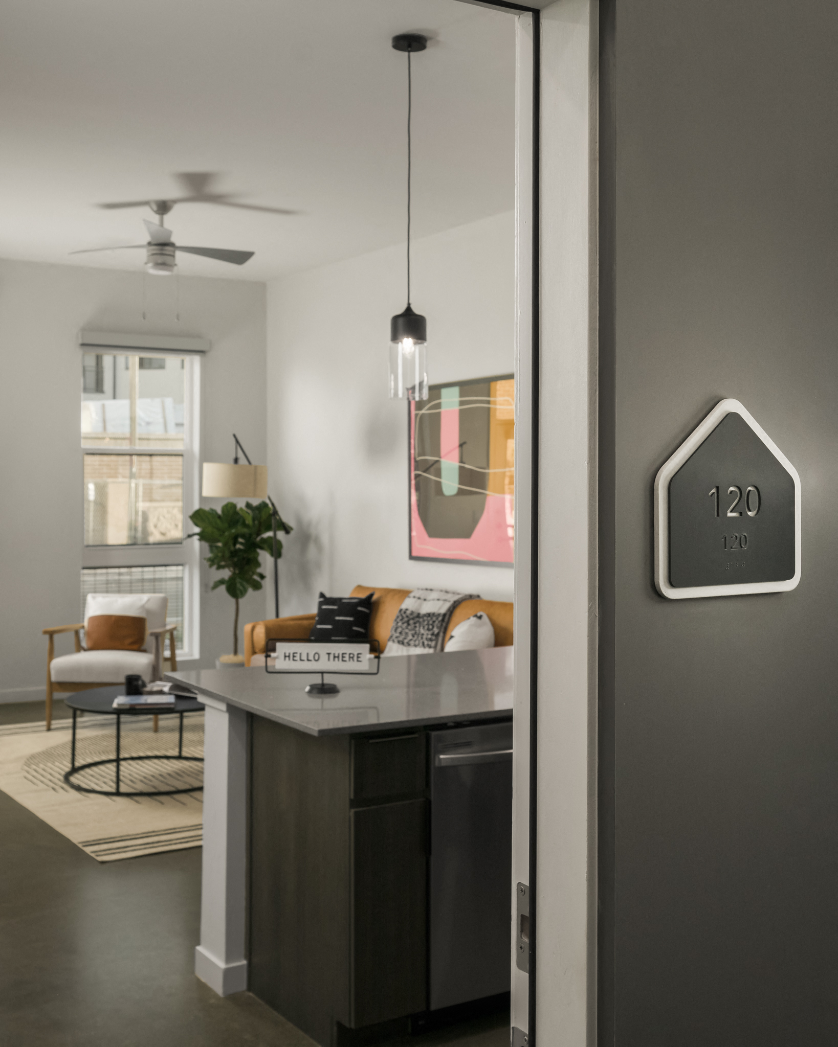 Apartment entrance from hallway looking into the kitchen