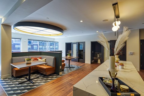 a living room with a couch and a table