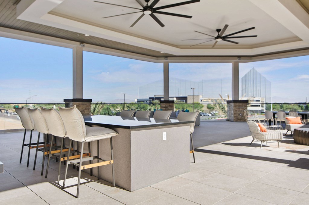 Rooftop Lounge at our Downtown Gilbert, AZ Community overlooking Top Golf Gilbert.