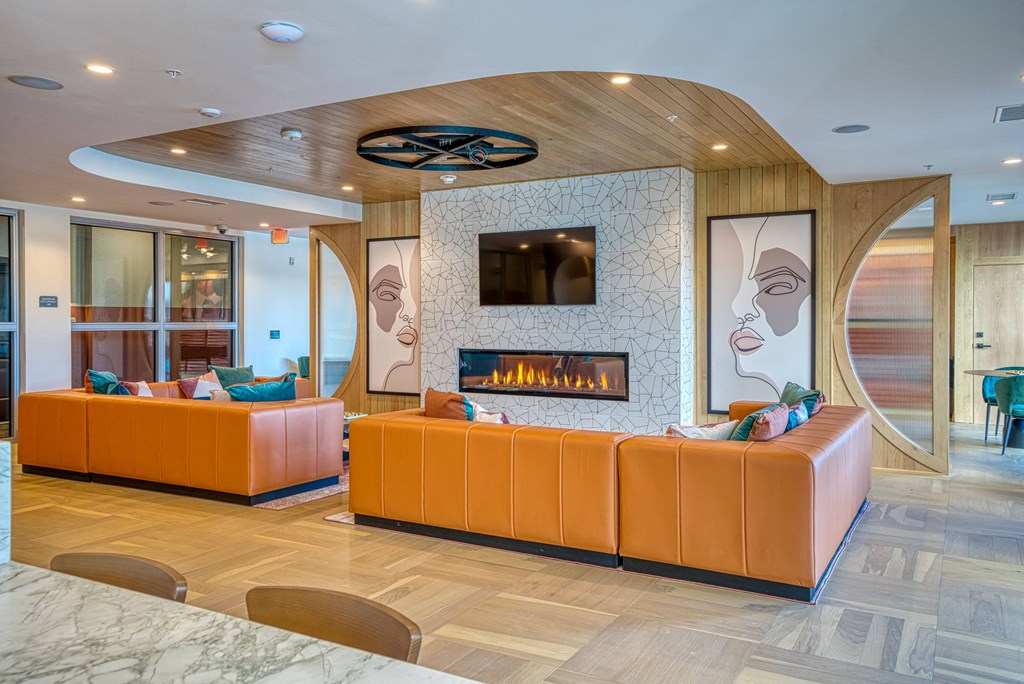 Clubroom with fireplace and shuffleboard