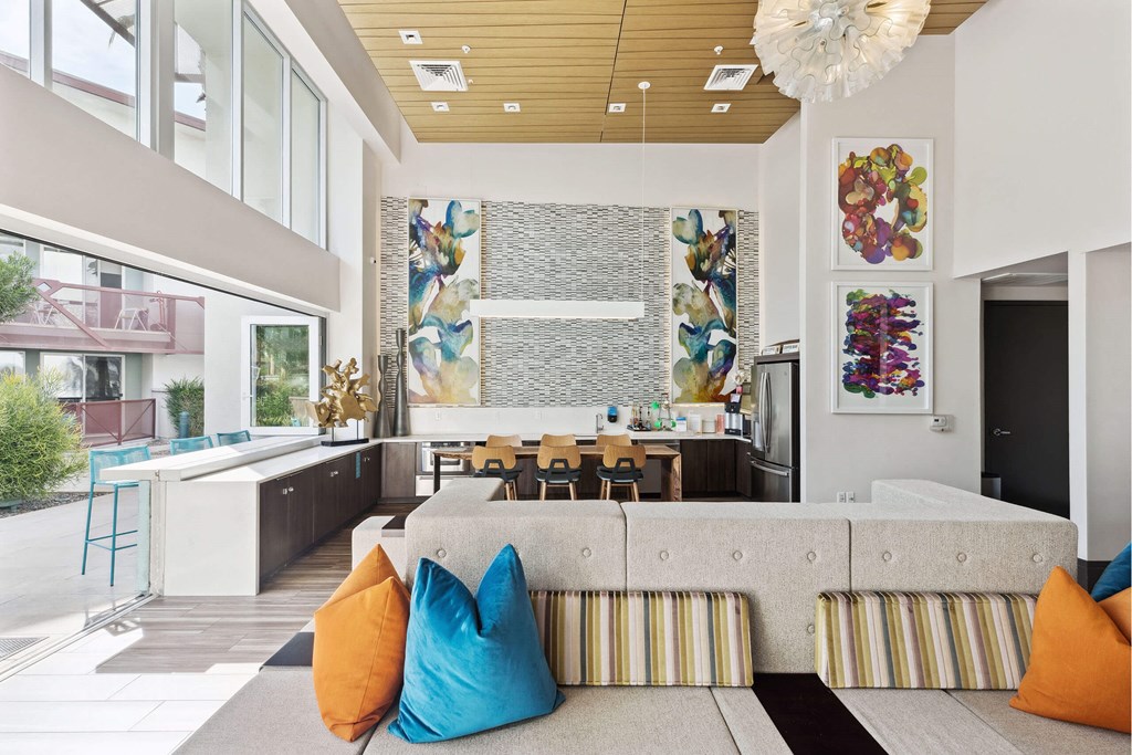 A living room with a couch and a table.