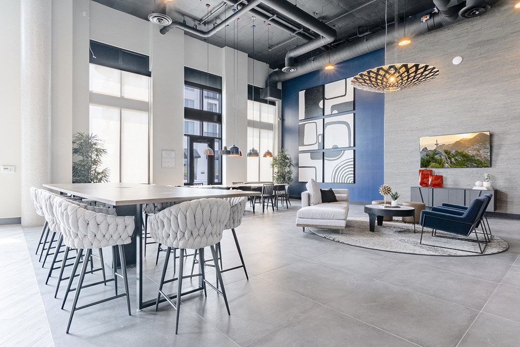 indoor work space with long tables and seating