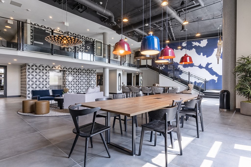 indoor work space with long tables and seating