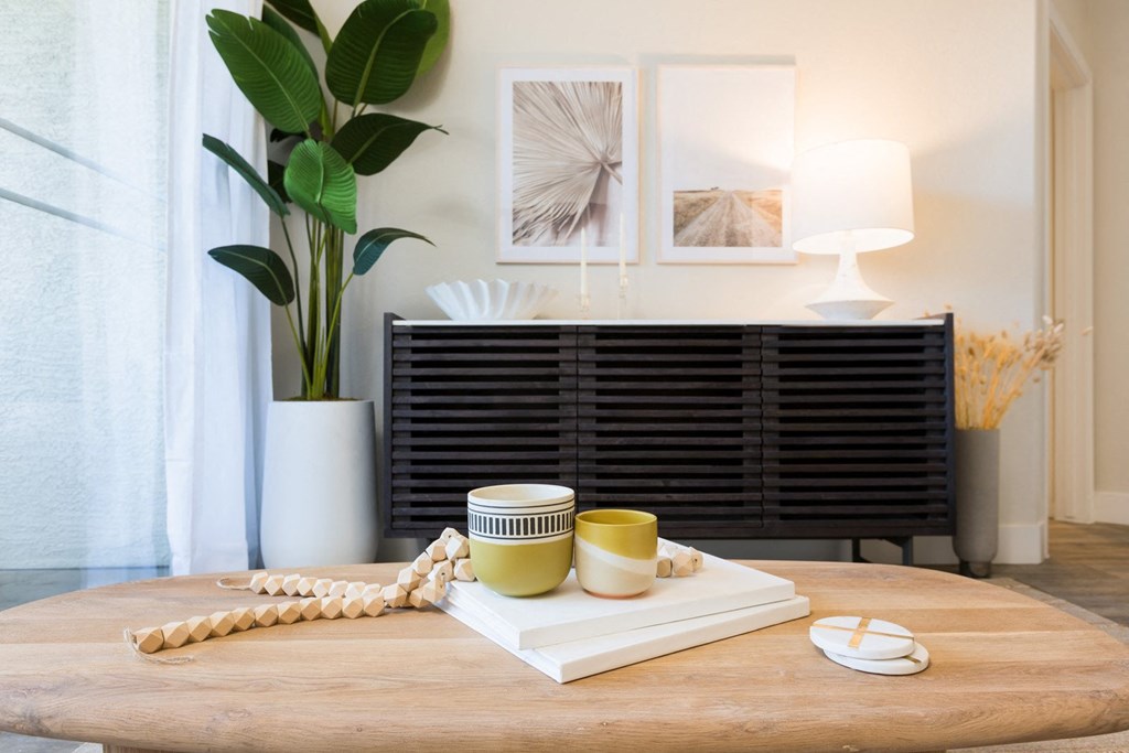 a coffee cup on a stack of books on a table
