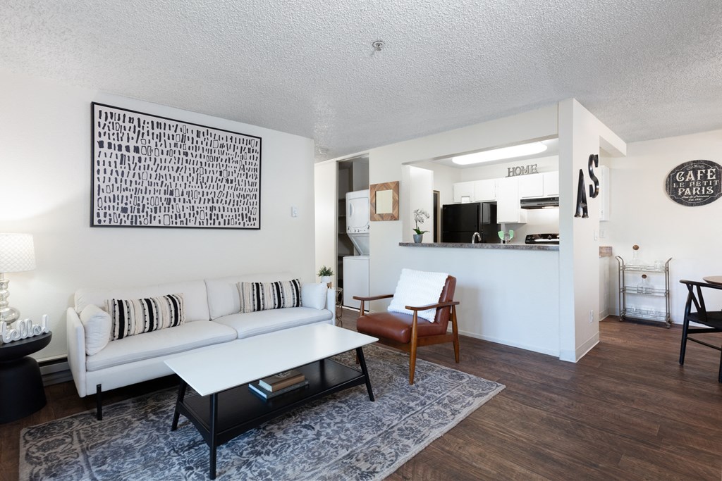 Two-BR Apartments In Livermore, CA - Autumn Springs - Living Room With Modern-Wood Flooring, Direct Access To Kitchen And Washer/Dryer Unit