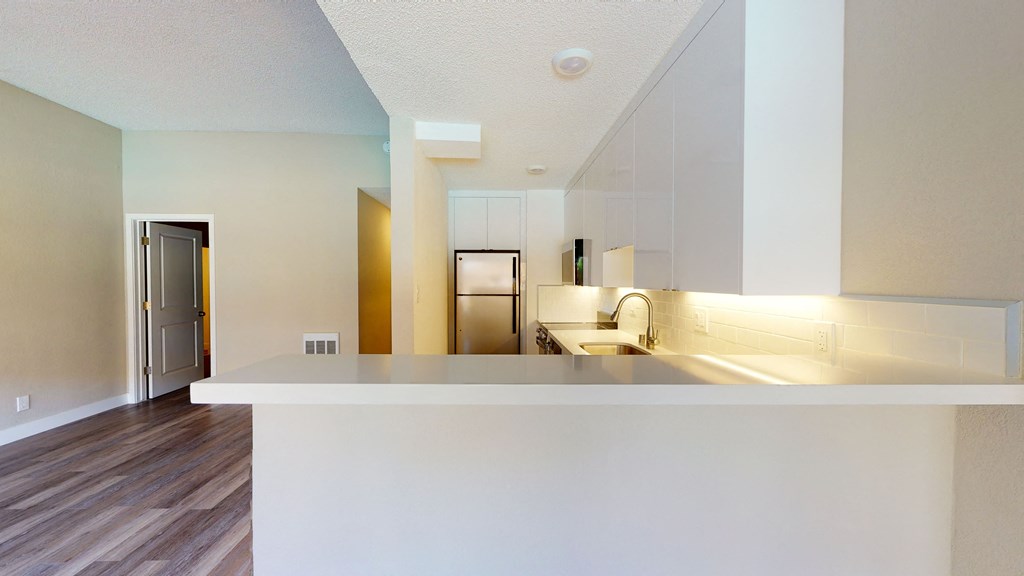 a view of the kitchen from the living room