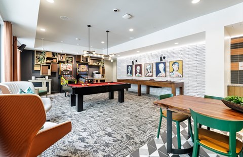 A modern dining area with a black and white checkered floor.