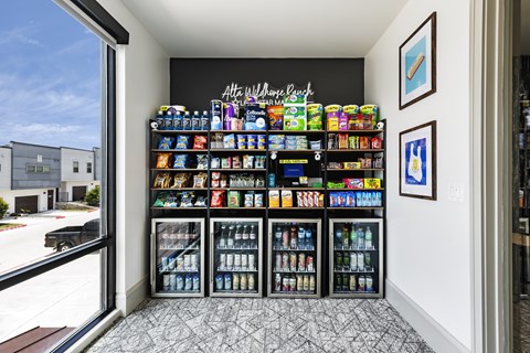 A vending machine with a variety of drinks and snacks.