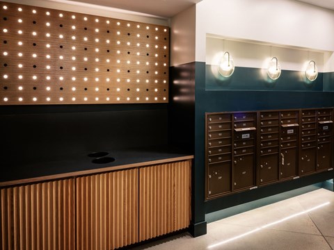 A wall of brown boxes with labels on them.