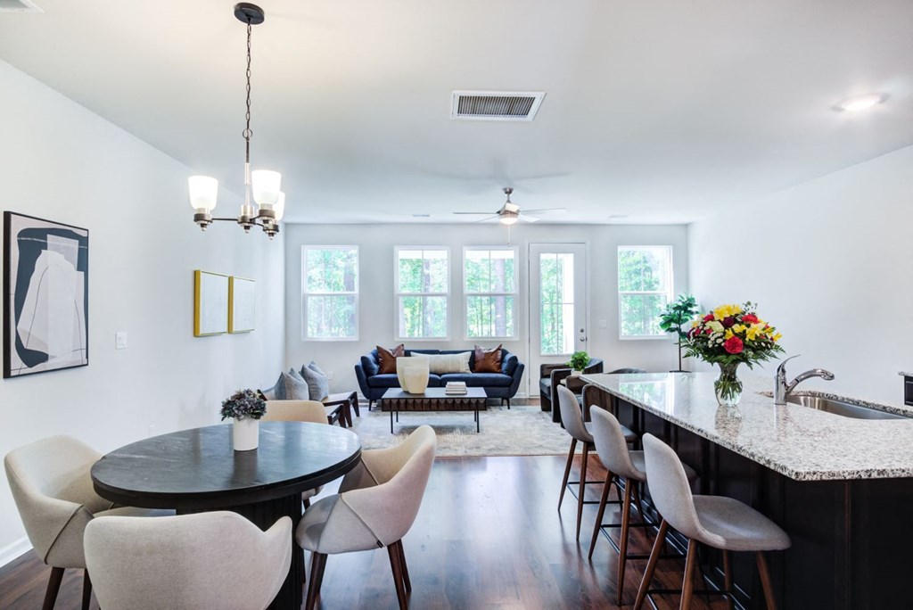 Dining area with round table and four chairs