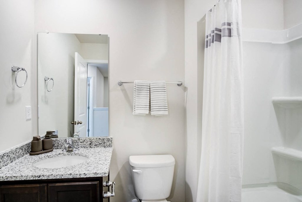 a bathroom with a sink toilet and shower at Berkeley Homes, South Carolina