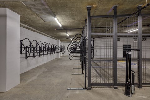 a view of the bike racks in the basement of the building