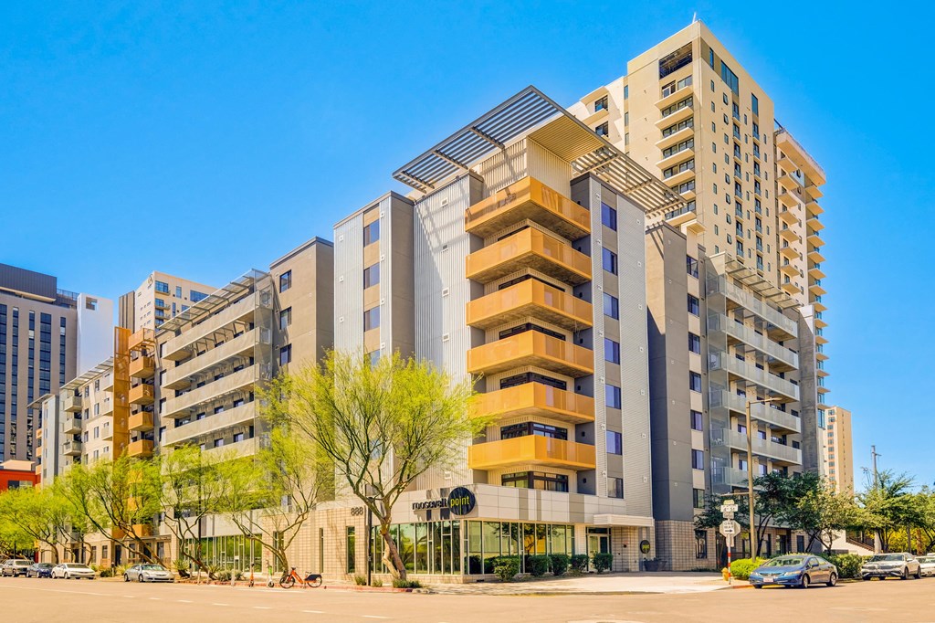 an image of an apartment building on a city street