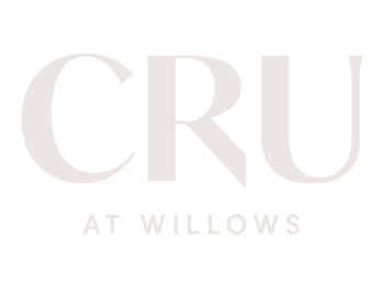 A logo with the letters CRU at willows.