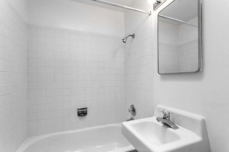 a bathroom with a sink and a bathtub