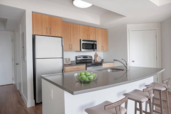 Kitchen Island with Bartop Seating and Sink on Counter - Photo Gallery 6