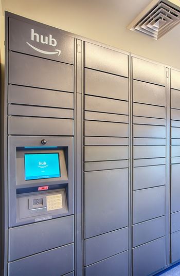 A row of lockers with a sign that says hub on the top.