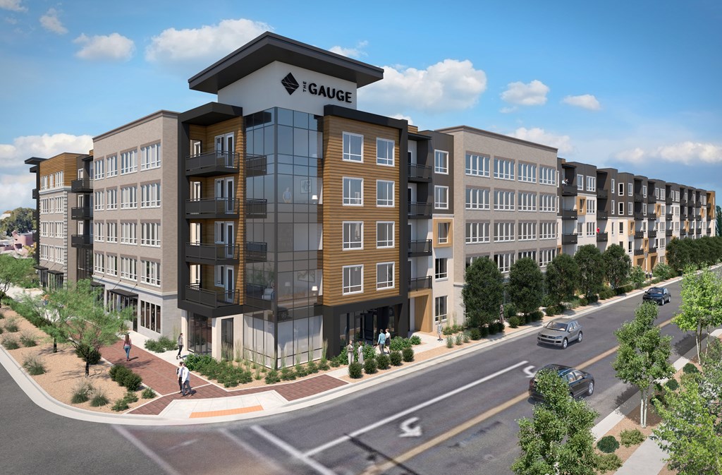 A modern building with the name "I Gauge" on the top.