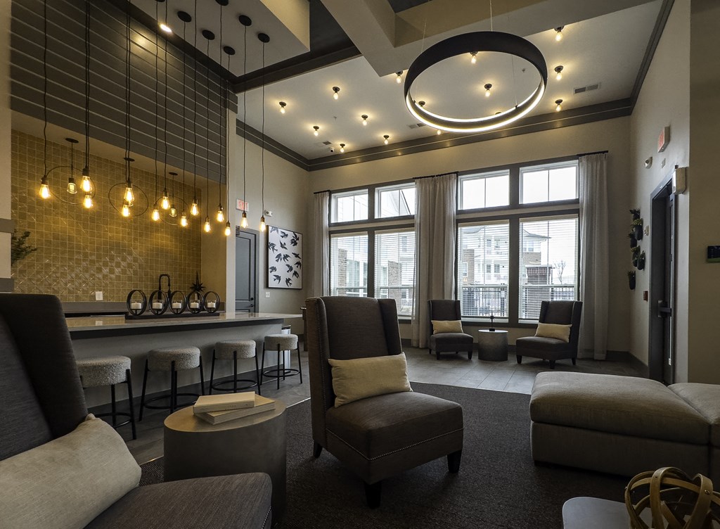 Resident Lounge with Gray Chairs and Sofa