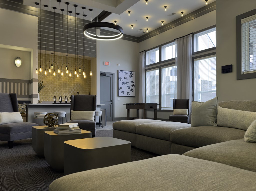 Large Gray Sectional Sofa Inside Resident Lounge