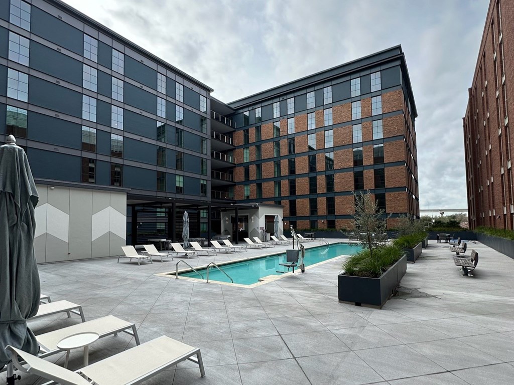 the pool area of a building at the tru