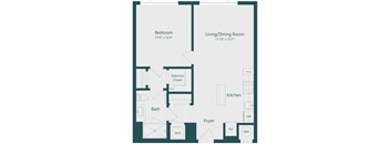 A floor plan of a small apartment with a bedroom, living/dining room, kitchen, bath, foyer, and laundry area.