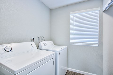 a laundry room with a washer and dryerat The Julia, Mesa, 85210