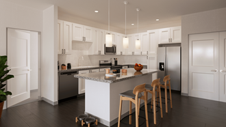 Apartment interior  kitchen with white cabinets and a large island with a granite countertop