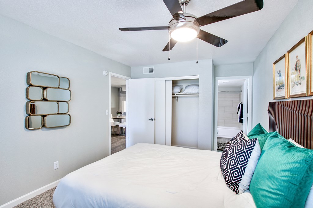 a bedroom with a bed and a ceiling fanat The Julia, Arizona, 85210