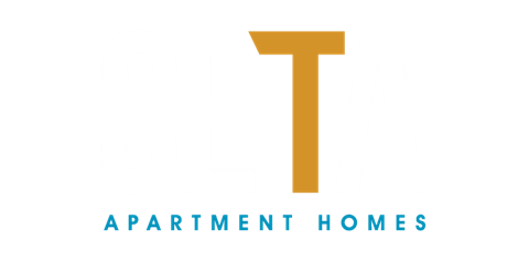 the logo for apartment homes with a t in the middle