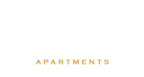 the apartments logo in gold against a white background