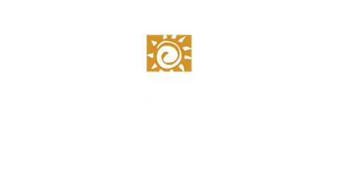 a logo for a company with a sun icon in a rectangle