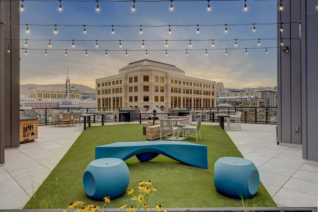Rooftop sky lounge with contemporary furnishings and skyline views Luma new Salt Lake City apartments.