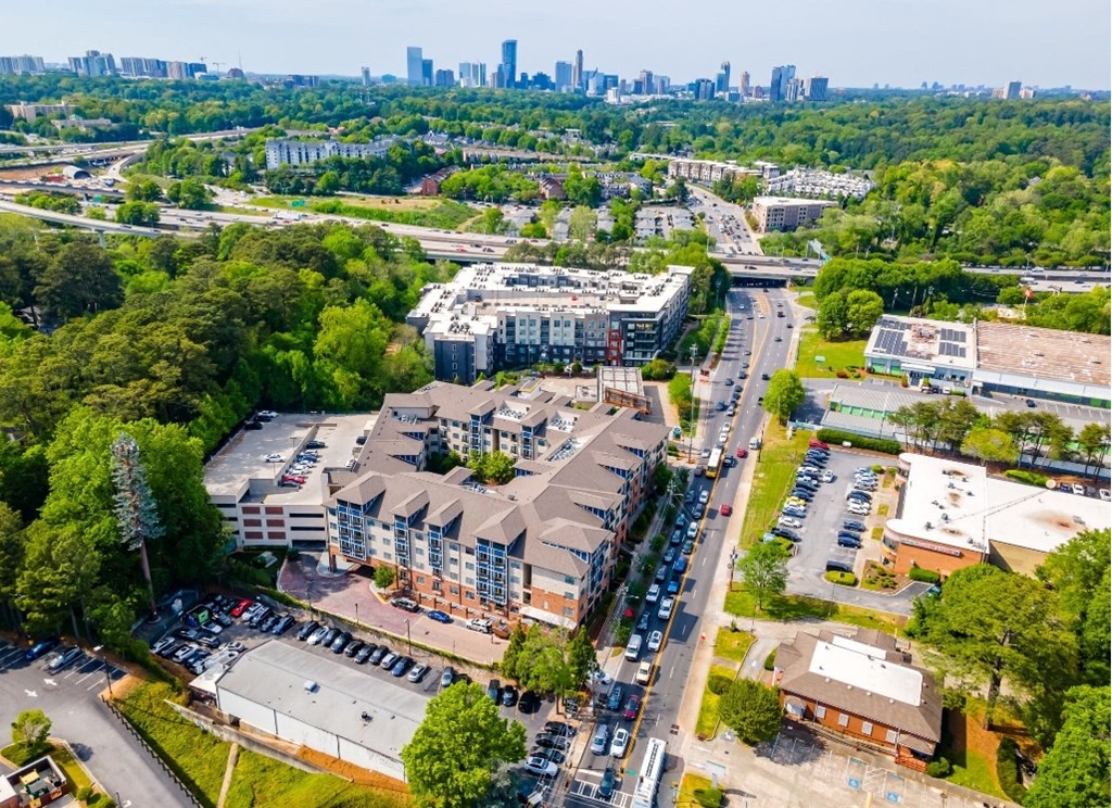 an aerial view of a building in the middle of a city