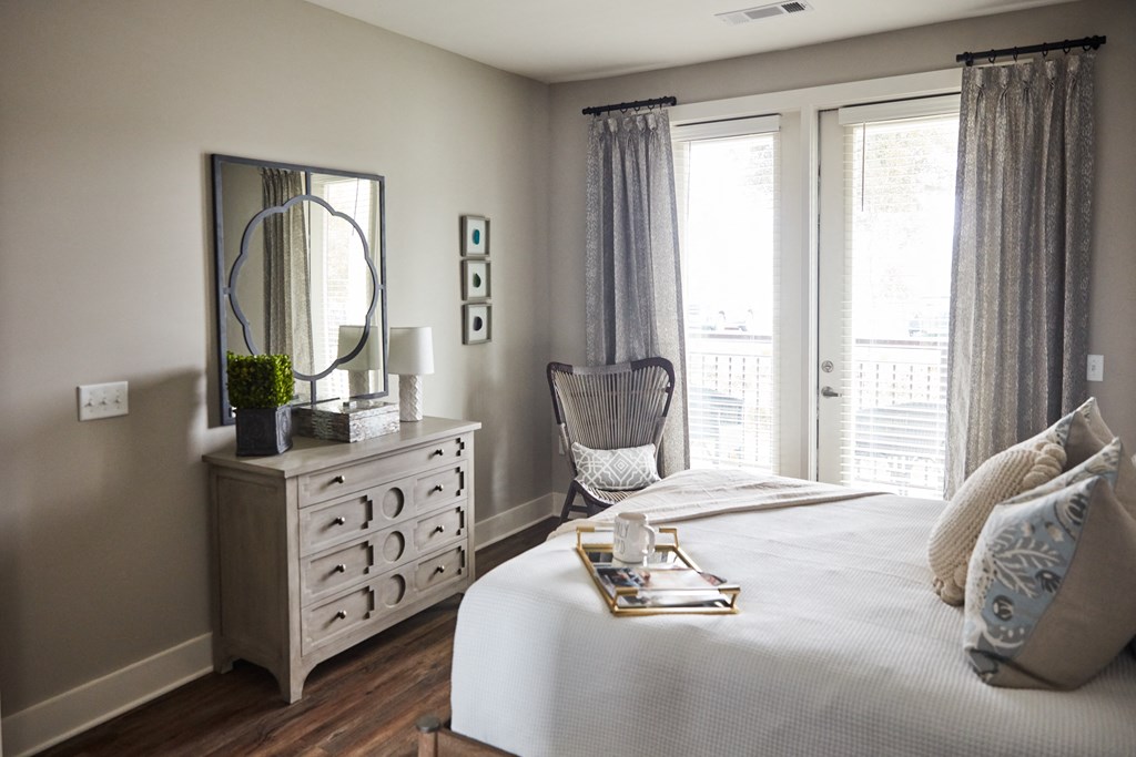 bedroom with large bed and ample natural light