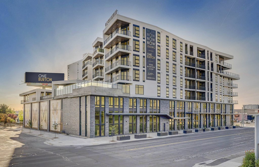A modern building with the sign "ONE BURTON" on the left side.