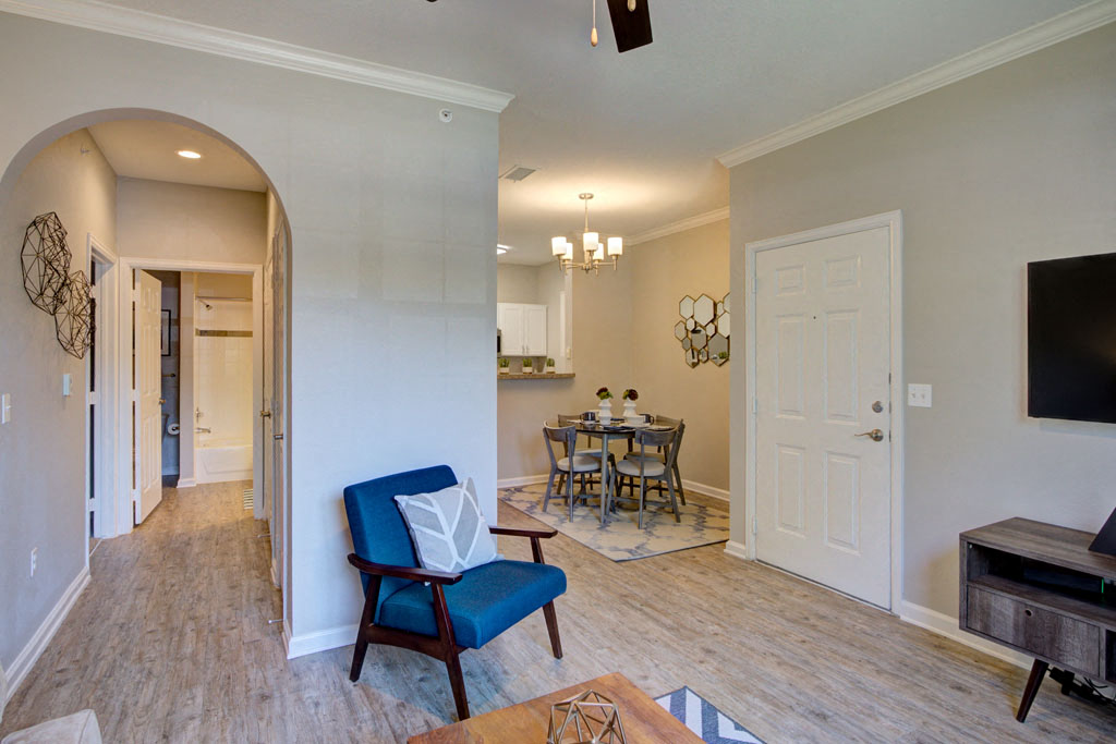 Living room/dining area with arch way interior wall in fort collins