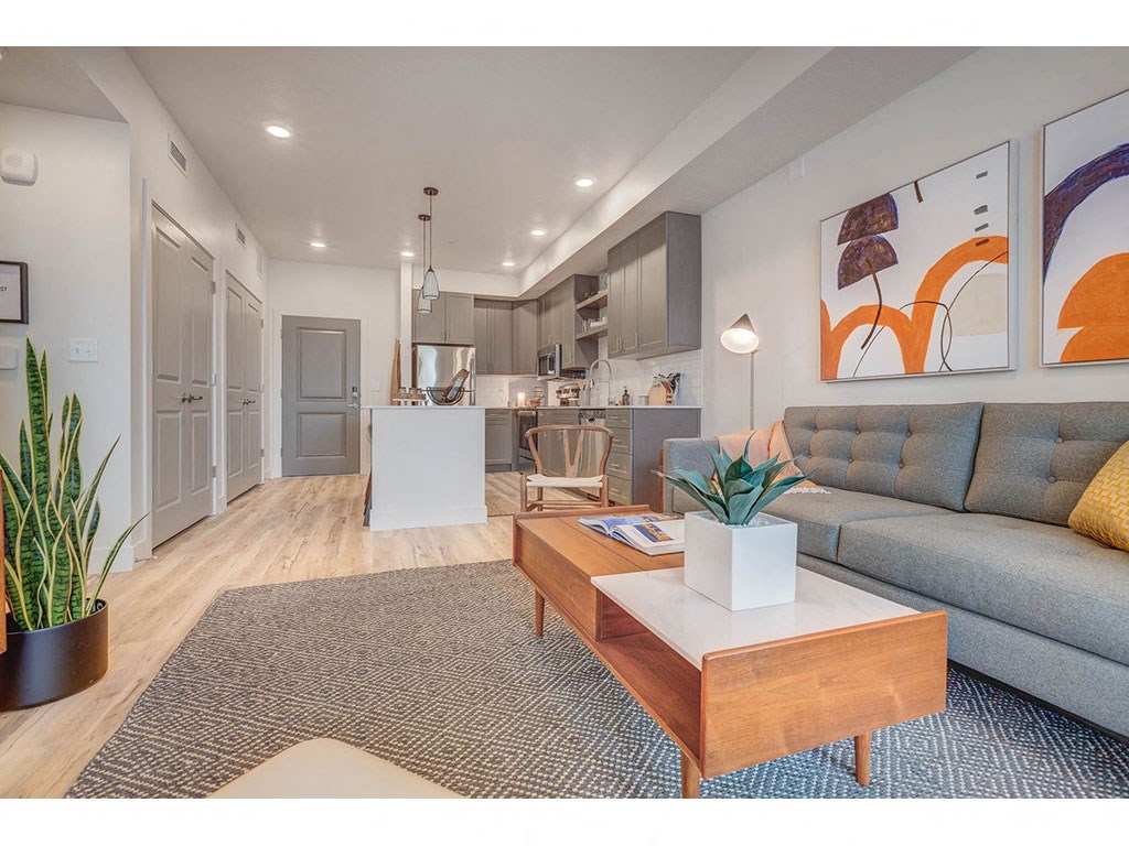a living room with a couch and a table