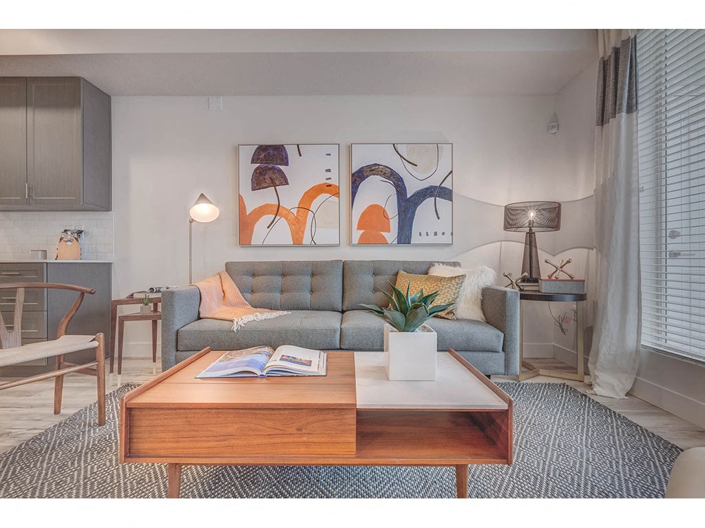 a living room with a couch and a coffee table