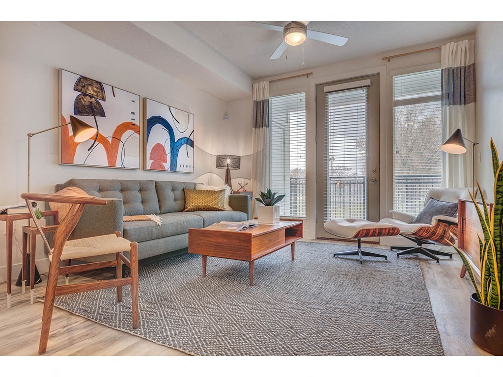 a living room with a couch and a table