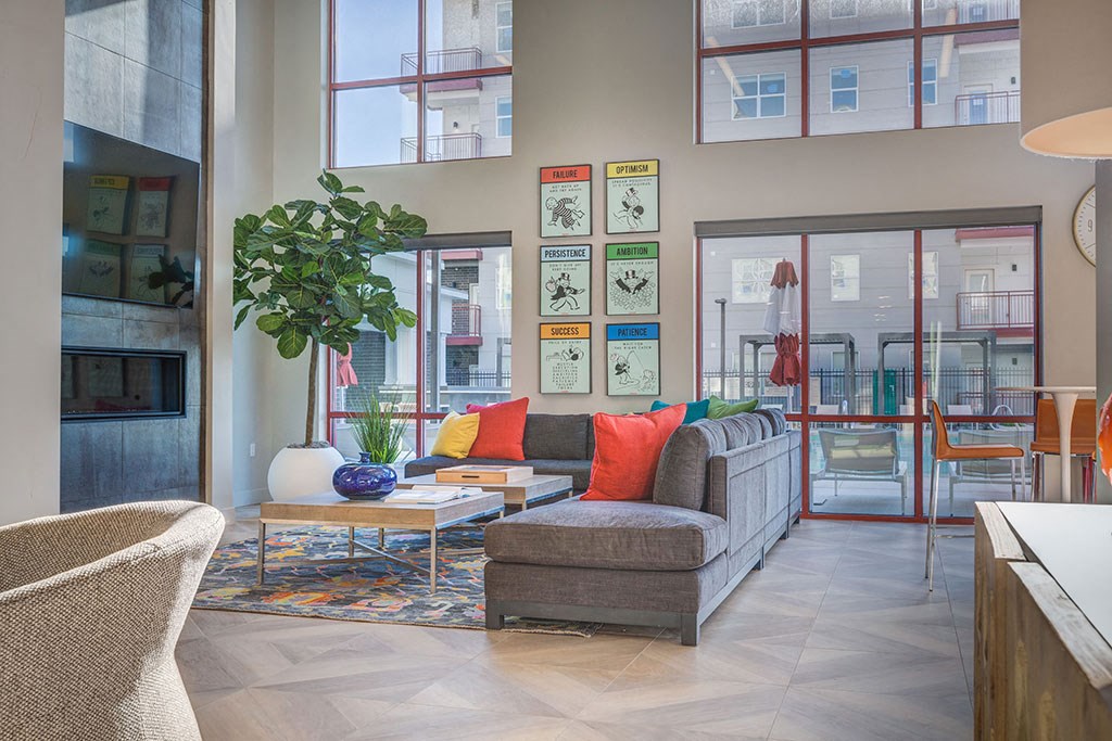 a living room with a couch and a table
