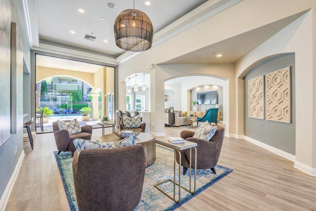 Clubhouse with couch  at Stone Canyon Apartments, Riverside, California