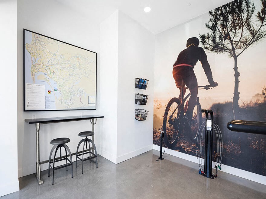 a room with a person riding a bike on the wall