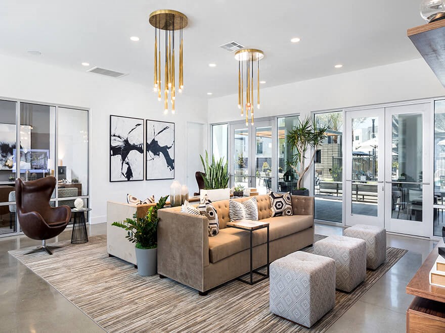 a living room with a couch and a rug